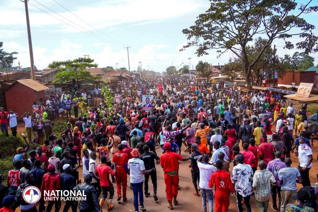 Unwavering Resolve: NUP Embarks on First National Tour Amidst Adversity in Buwenge, Kamuli," describes the beginning of the National Unity Platform's first national tour in Eastern Uganda, led by Robert Kyagulanyi (Bobi Wine). It highlights the large gatherings of Ugandans, despite challenges like intimidation and teargas, showing their support for change. The article also notes an upcoming visit by President Yoweri Museveni to Bugweri District, emphasizing the heightened political engagement across the region. The piece encourages Ugandans everywhere to remain informed and engaged in this pivotal time.