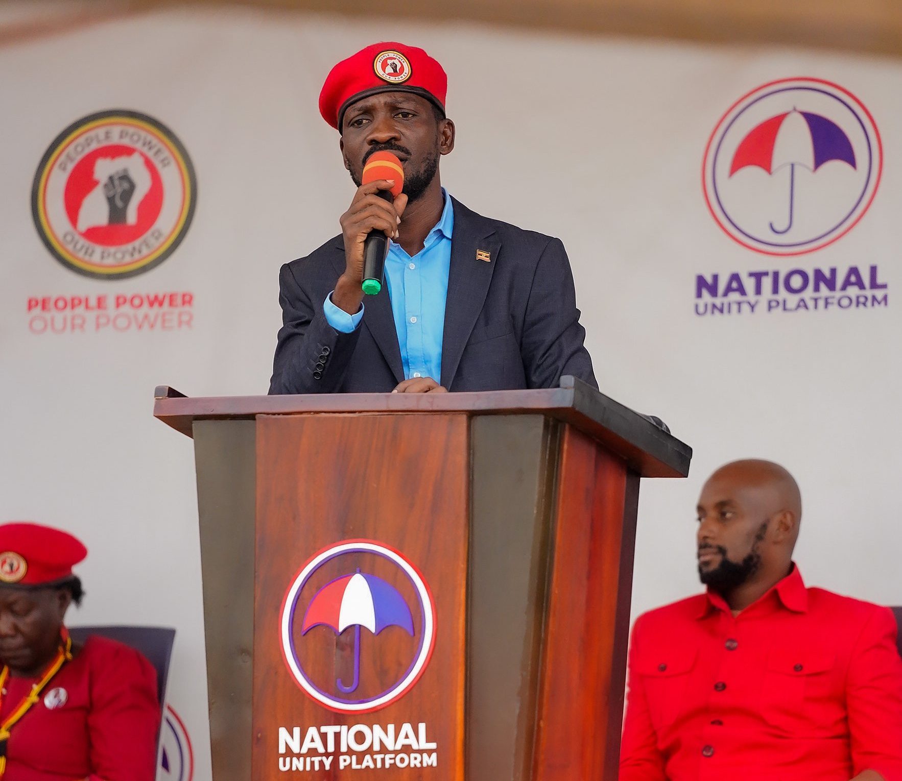 National Unity Platform (NUP) leaders addressing the press and public, discussing human rights abuses and corruption in Uganda, highlighting the cases of Ronald Mayega, Anderson Burora, and evictions by NEMA