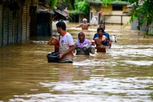 The images show the heartbreaking reality faced by millions in eastern Bangladesh, with scenes of despair, resilience, and hope amidst the unfolding tragedy.