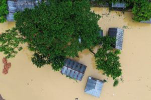 The images show the heartbreaking reality faced by millions in eastern Bangladesh, with scenes of despair, resilience, and hope amidst the unfolding tragedy.