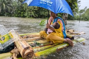 The images show the heartbreaking reality faced by millions in eastern Bangladesh, with scenes of despair, resilience, and hope amidst the unfolding tragedy.